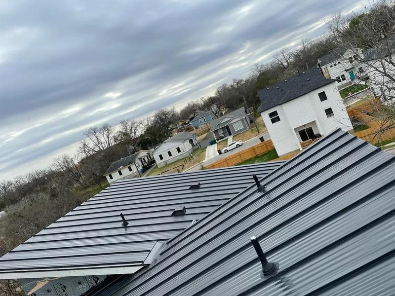 Standing seam metal roof panels with vents for Skylight Repair in Collierville